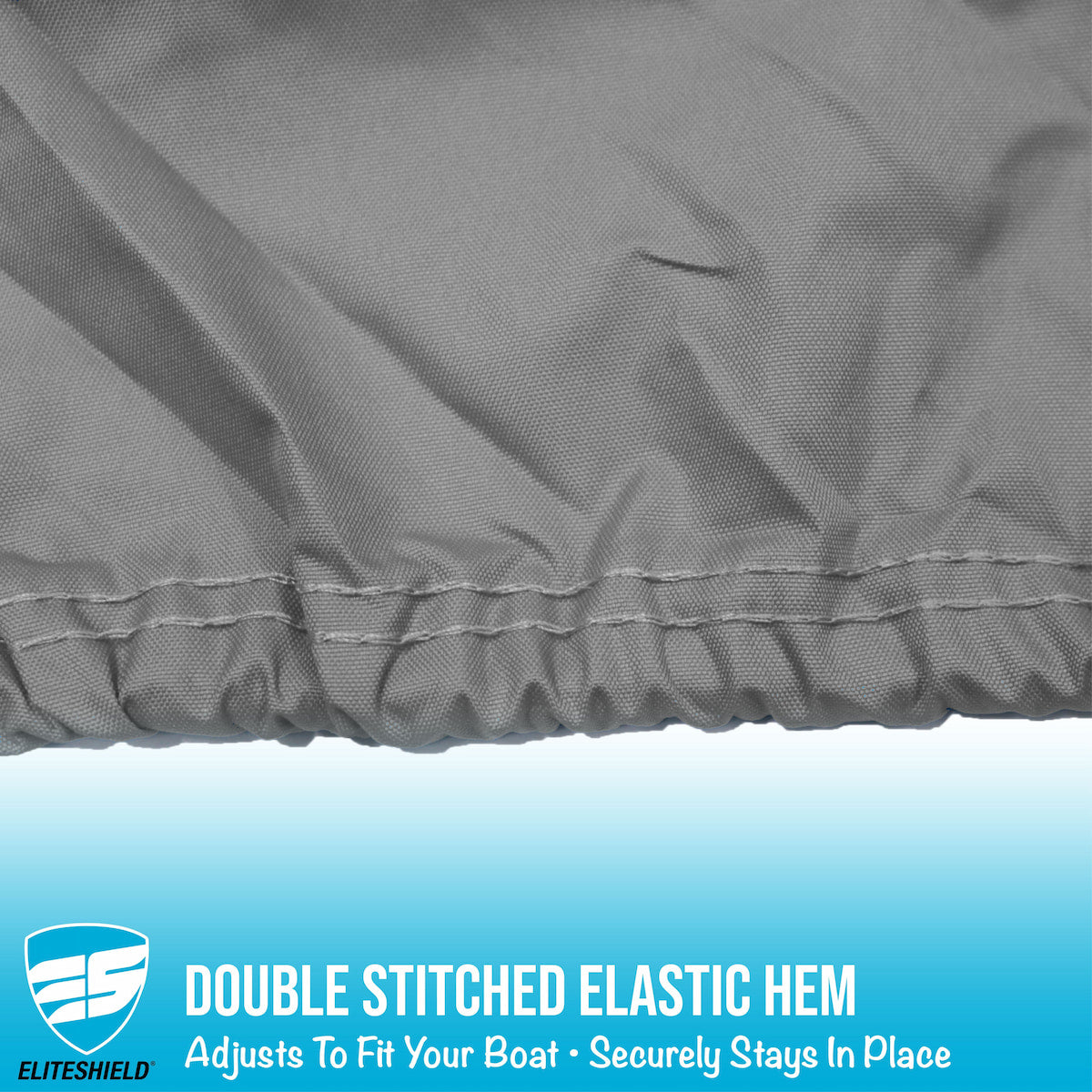 Close-up of a gray boat cover with a double-stitched elastic hem, featuring the Eliteshield brand.